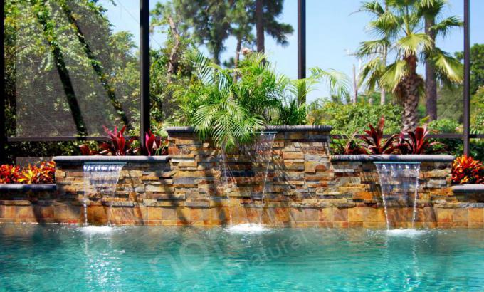 Thin Stone Veneer Panels Used for Rising Water Feature Wall on Pools